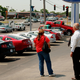A car salesman with a customer at a Ford dealership in Downers Grove, Illinois. Image: Getty
